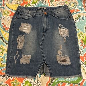 Refuge denim distressed skirt size medium.